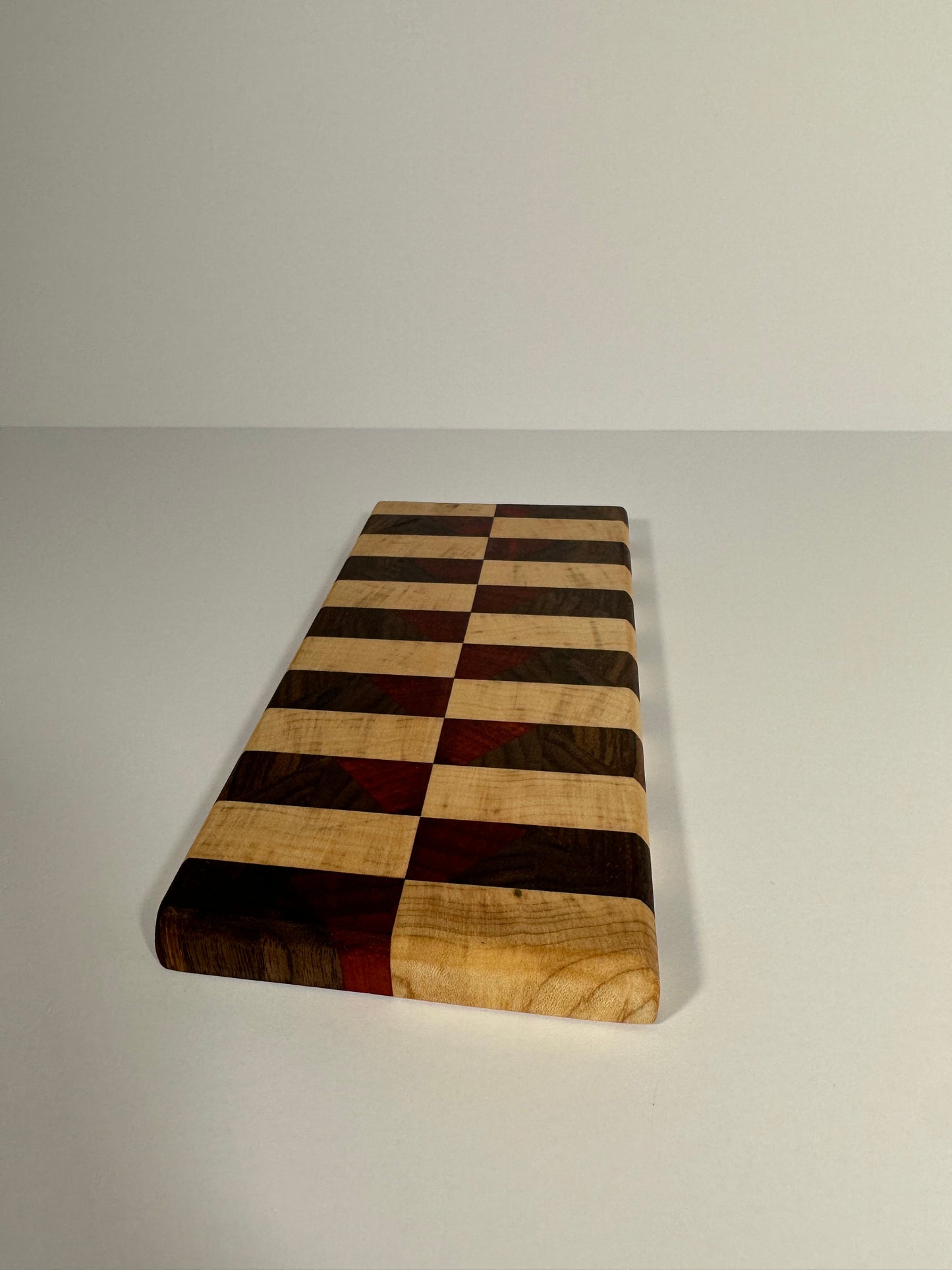 Exquisite Handcrafted Hardwood Charcuterie Board - Black Walnut, Zebra Maple, Padauk - 8 1/2" x 3 3/4"